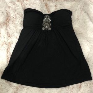 Sleeveless embellished halter.